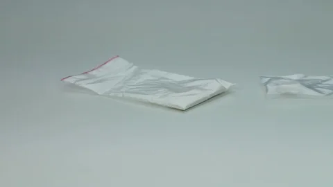 Cocaine falls on the table Stock Footage 89325479