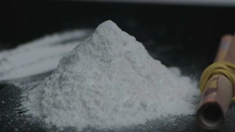 Cocaine powder on black background Stock Footage 138333733