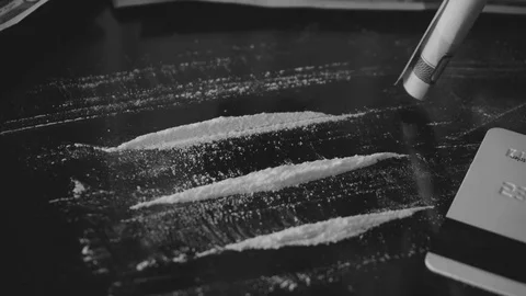 Cocaine Snorted Through Rolled 100 Dollar Banknote Stock Footage 72668788