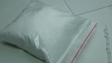 Cocaine strips and tablets on the table are ready for use Stock Footage 89325948