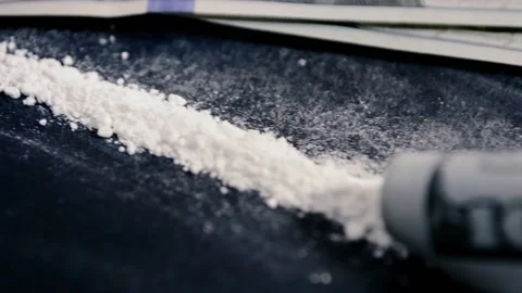 Cocaine on the table with dollars Stock Footage 136458254