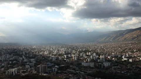 Cochabamba Bolivia South America cityscape timelapse cloudy golden hour sunset Stock Footage
