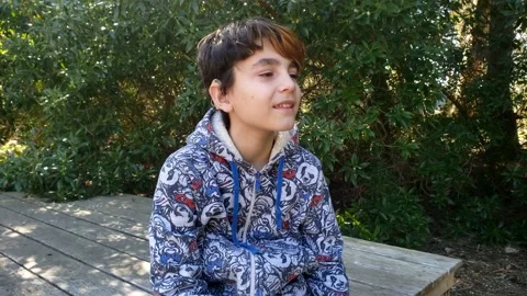 Cochlear implant boy thinking Video stock 138847460