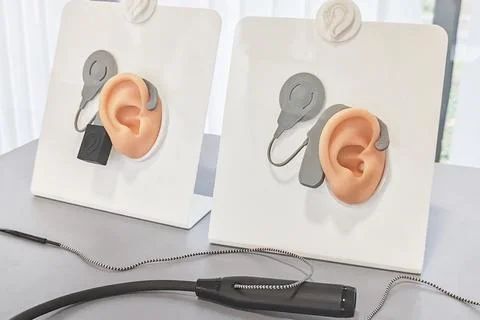 Cochlear Implant External Processor Display In Clinic Stock Photos