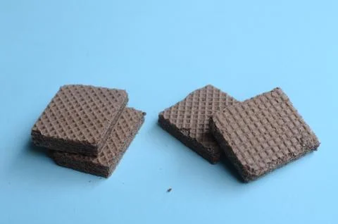 Cocholate wafers with a blue background Stock Photos