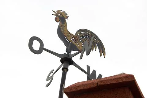 Cock-shaped windmill Stock Photos