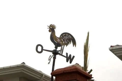 Cock-shaped windmill Stock Photos