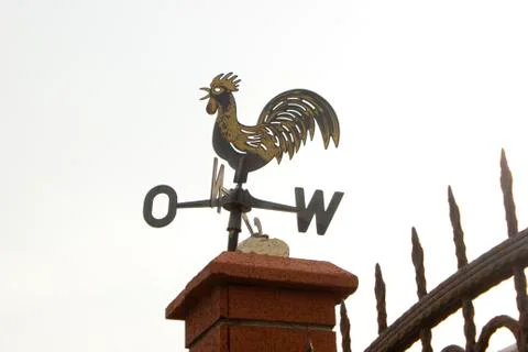 Cock-shaped windmill Stock Photos