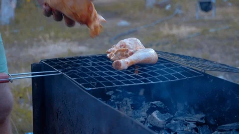 Cocking barbecue on open fire in mountain on nature Stock Footage 106542809