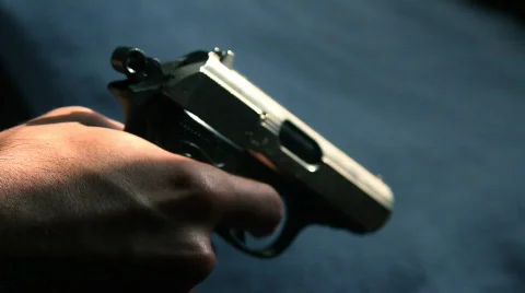 Cocking Pistol Stock Footage