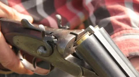 Cocking a shotgun. Stock Footage 22023819