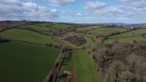 Cockington, South Devon, England: Drone View: Cockington Court parkland area Stock Footage 197406192