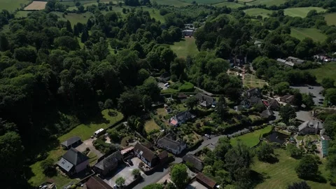 Cockington, South Devon, England: DRONE VIEWS: Cockington Village and Court Stock Footage 243727582
