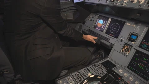 The cockpit of the aircraft. The pilot checks the electronics of the aircraft. Stock Footage 97995845
