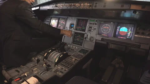 The cockpit of the aircraft. The pilot checks the electronics of the aircraft. Stock Footage 97996673