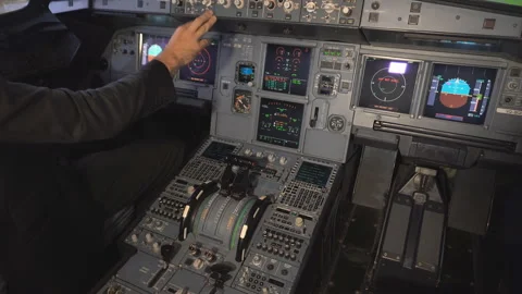 The cockpit of the aircraft. The pilot checks the electronics of the aircraft. Stock Footage 97997466