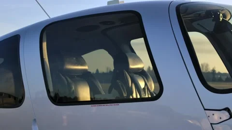 Cockpit and Cabin Plexiglas Windows of a Propeller Airplane Close Up Stock-Footage 303894203