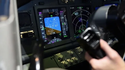 Cockpit display panel while aircraft turn left Stock Footage