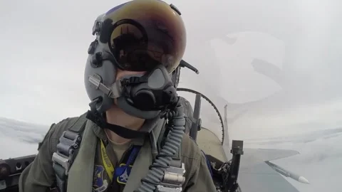 From the cockpit F-15 Eagle pilot flying through clouds Stock Footage 263722678
