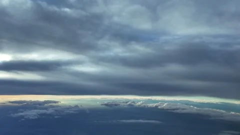 Cockpit POV Flying Under an Endless Layer of Darkening Stratus Clouds with a Stock Footage 333409809