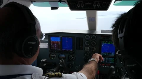 In the cockpit with two pilots Stock Footage 68698226