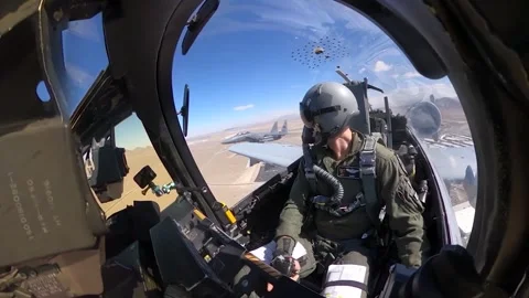 From the cockpit USAF pilot flying A-10 Thunderbolt with F-15 Eagle on the wing Stock Footage 272588312