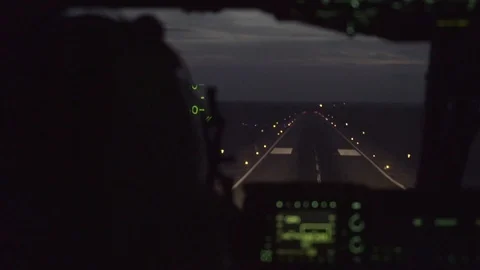 Cockpit view of C-17 Globemaster landing at dusk Stock Footage 105349879