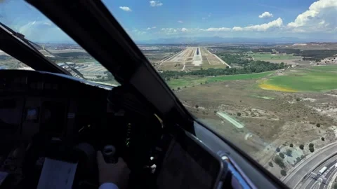 Cockpit View: Hand of a Pilot at the Flight Controls of a Jet Airplane on Final Vídeos de archivo 334443904
