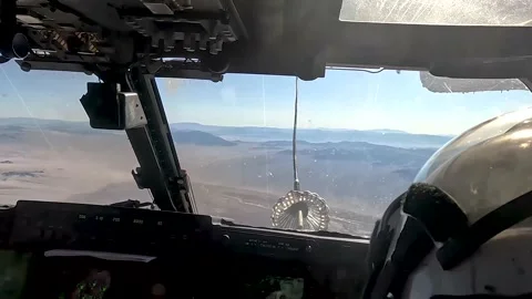 Cockpit view from MV-22 Osprey connecting with drogue for aerial refuel  Stock Footage 232393939