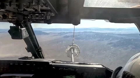 Cockpit view from MV-22 Osprey in-flight refuel  Stock Footage 232393943