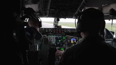 Cockpit view of pilots taking off in KC-135 Stratotanker for refuelling mission Stock Footage 256972148