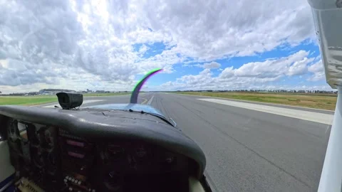 Cockpit view of a small plane takeoff on an airport runway Video stock 343447511