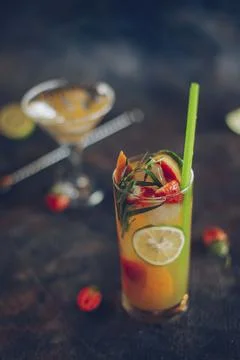 Cocktail on a  dark stone table. Top view with space for your text Stock Photos