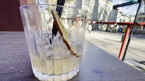 Cocktail drink with orange slice close up Video stock 333652086