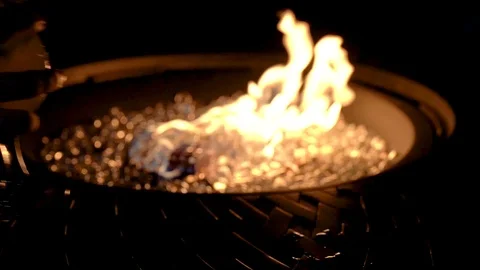 Cocktail drinks on fire pit tropical drinks on fire background slow motion Stock Footage 115545754