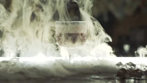 Cocktail with dry ice on the bar Stock Footage 114363640