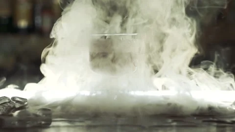 Cocktail with dry ice on the bar 스톡 동영상 114364612