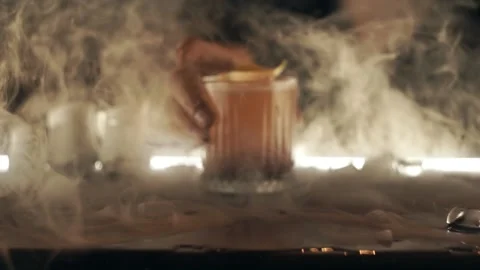 Cocktail with dry ice at bar Stock Footage 119314474