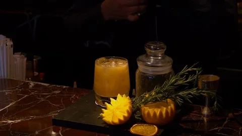 Cocktail with a dry orange slice Stock Footage 108288153