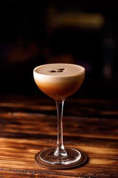 Cocktail espresso martini based on coffee, liqueur coffee and vodka Stock Photos