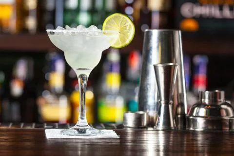 Cocktail garnished with lime. Stock Photos