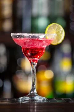 Cocktail garnished with lime. Stock Photos