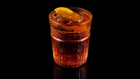 Cocktail glass on black background with reflection Stock Footage 90707641