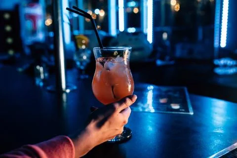 Cocktail in hand Stock Photos