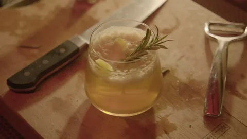 Cocktail with Herb Garnish on Bar Counter in Beijing China, Close Up Food Stock Footage 345754863