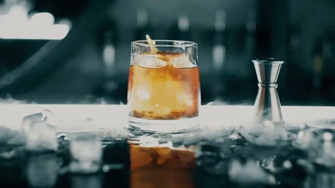Cocktail with ice on the bar Stock Footage 113264073