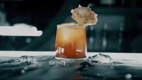 Cocktail with ice on the bar Видео 113464727