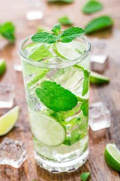 Cocktail with lime and mint Stock Photos