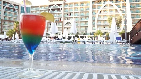 Cocktail near the swimming pool Stock Footage