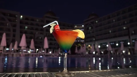 Cocktail near the swimming pool Stock Footage